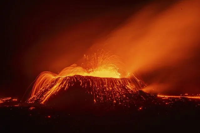 Explosive activity around 200 meters away from the crater near the town of Grindavik, Iceland, Tuesday April 9, 2024. The volcano in southwestern Iceland that erupted three times in December, January and February, sending lava towards a nearby community, keeps erupting. (Photo by Marco di Marco/AP Photo)