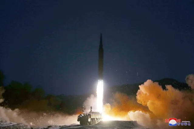 This picture taken on January 11, 2022 and released from North Korea's official Korean Central News Agency (KCNA) on January 12, 2022 shows what North Korea says a hypersonic missile test-fire conducted by the Academy of Defence Science of the DPRK at an undisclosed location. (Photo by KCNA via KNS/AFP Photo)