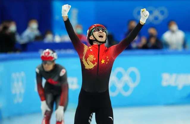 Wu Dajing of Team China celebrates after winning the Mixed Team Relay Final A on day one of the Beijing 2022 Winter Olympic Games at Capital Indoor Stadium on February 5, 2022 in Beijing, China. (Photo by Aleksandra Szmigiel/Reuters)