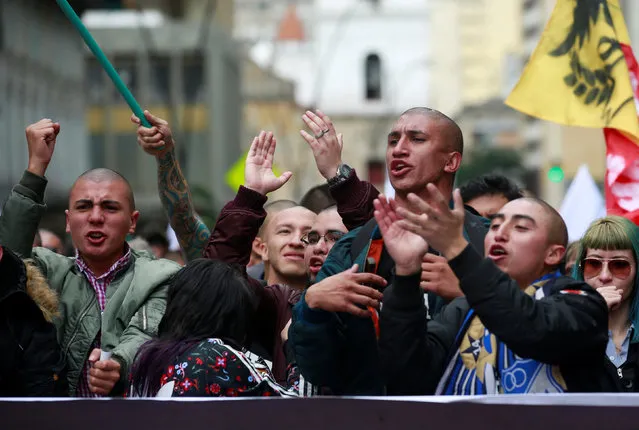 Demonstrators shouts slogans during May Day protests in Bogota, Colombia, May 1, 2016. (Photo by John Vizcaino/Reuters)