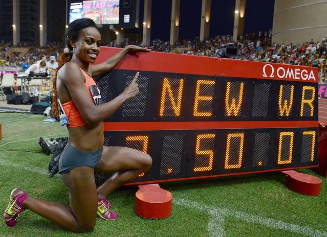 Genzebe Dibaba of Ethiopia celebrates her new world record in the 1500 meters women event at the IAAF Diamond League Herculis meeting at the Louis II Stadium in Monaco, July 17, 2015. (Photo by Jean-Pierre Amet/Reuters)