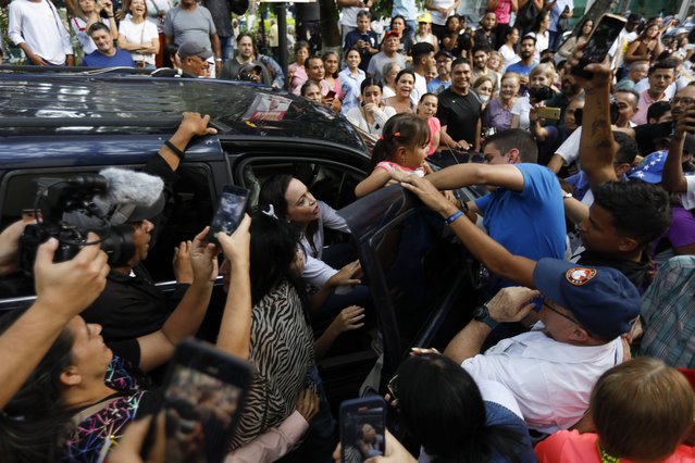 Opposition leader Maria Corina Machado says goodbye to her supporters after a demonstration with Christian faithful in Caracas, Venezuela on July 21, 2024. Venezuela will hold its presidential elections on July 28. (Photo by Pedro Rances Mattey/Anadolu via Getty Images)