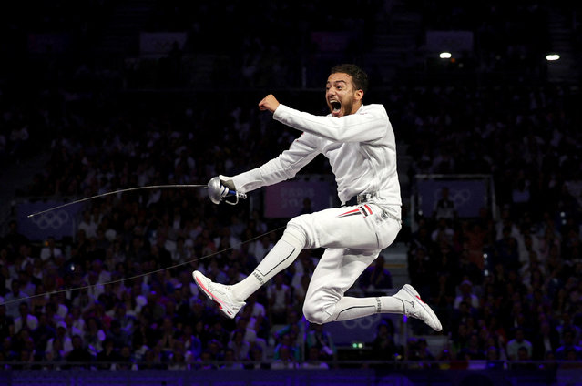 Egypt's Mohamed Elsayed celebrates as he competes against Hungary's Tibor Andrasfi in the men's epee individual bronze medal bout during the Paris 2024 Olympic Games at the Grand Palais in Paris, on July 28, 2024. (Photo by Maye-E Wong/Reuters)