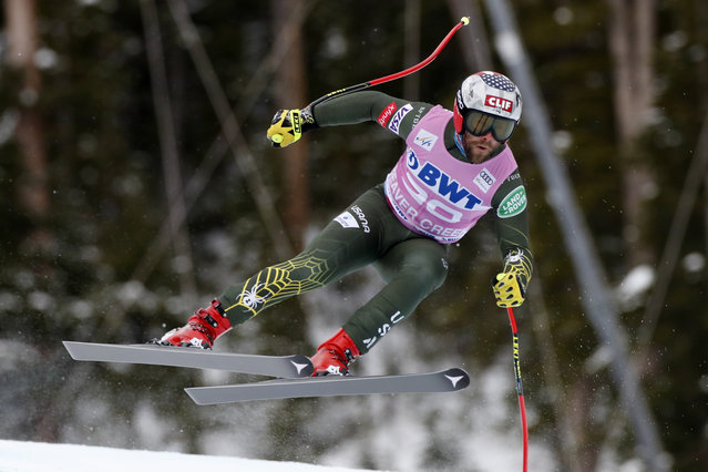 In this December 7, 2019, file photo, United States' Travis Ganong skis during a men's World Cup downhill skiing race in Beaver Creek, Colo. Italian downhill racer Dominik Paris writes his own lyrics as the lead singer of a heavy power metal band. American Travis Ganong opened a coffee shop, while teammate Tommy Ford is into art (more specifically, drawing) and Alice Merryweather gives Tarot card readings. These outside passions are a way for racers to take their minds off always thinking about racing. (Photo by Robert F. Bukaty/AP Photo/File)
