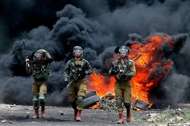 Israeli forces intervene demonstrators during a protest against the building of Jewish settlements and separation wall at Kafr Qaddum village of Nablus, West Bank on May 24, 2019. (Photo by Nedal Eshtayah/Anadolu Agency/Getty Images)