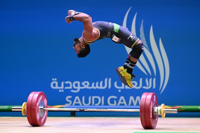 Nawaf Almazyadi of Team Al Taraf celebrates after performing a snatch during the Men's Weightlifting 67Kg Competition on day seven of the Saudi Games 2024 on October 09, 2024 in Riyadh, Saudi Arabia. The Saudi Games is a multi-game combined sports tournament and the largest national sporting event held annually in the Kingdom. (Photo by Stuart Franklin/Getty Images for Saudi Games)