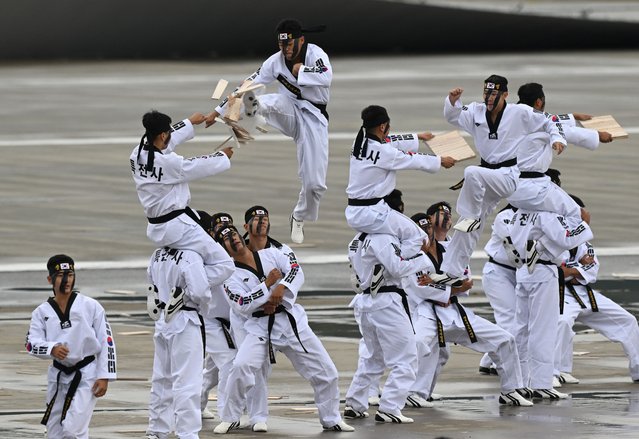 South Korean soldiers demonstrate their taekwondo skills during a ceremony to mark the 76th anniversary of Korea Armed Forces Day at Seoul Air Base in Seongnam on October 1, 2024. (Photo by Jung Yeon-je/AFP Photo)