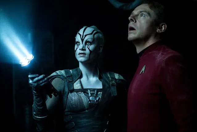 In this image provided by Paramount Pictures, Sofia Boutella, left, plays Jaylah and Simon Pegg plays Scotty in Star Trek Beyond. “Star Trek Beyond” has landed atop the weekend box office. According to studio estimates Sunday, July 24, 2016, the latest outing for the Starship Enterprise soared to $59.6 million in North American ticket sales, knocking “The Secret Life of Pets” from the No. 1 spot. (Photo by Kimberley French/Paramount Pictures via AP Photo)