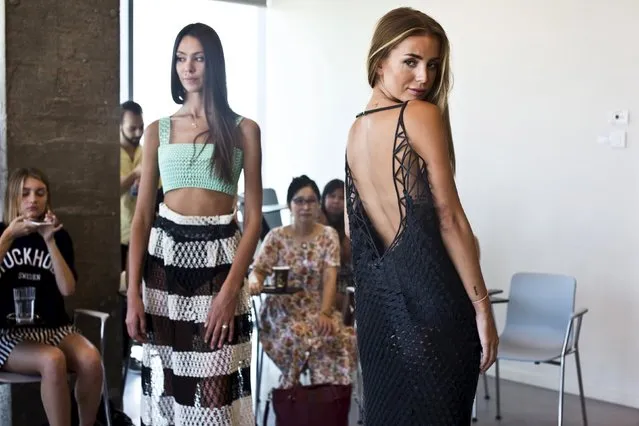 Fashion bloggers wear outfits from Israeli fashion design student from the Shenkar College of Engineering and Design Danit Peleg's graduate collection during a conference on 3-D printing in Tel Aviv, Israel September 3, 2015. Peleg, 27, says she spent over 2000 hours to create her graduate collection which is made solely from home 3-D printers. International fashion bloggers, taking part in a project supported by “Stand With Us Israel fellowship” (Photo by Nir Elias/Reuters)