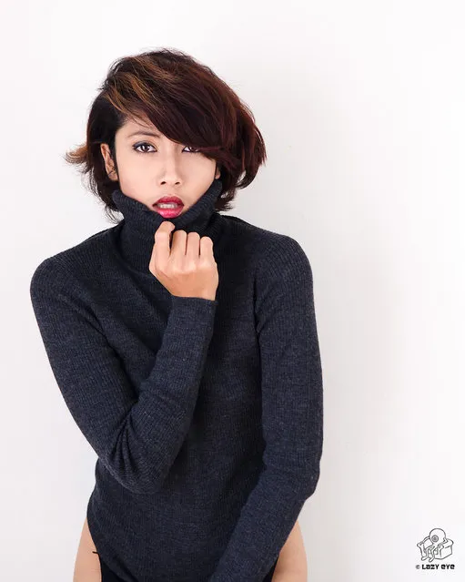 s*xy Asian Beauty. Snug in a Sweater