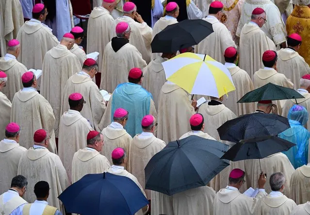 Cardinals and Bishops attend, under the rain, a Pope's beatification mass of late Pope John Paul I, on September 4, 2022 at St. Peter's square in the Vatican. (Photo by Vincenzo Pinto/AFP Photo)