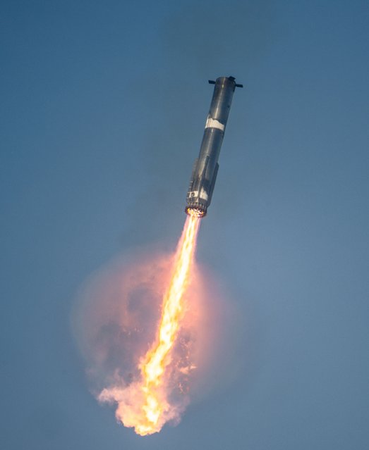 The SpaceX Starship Flight 8 booster returns from its ascent at Boca Chica beach on March 06, 2025 in Boca Chica Beach, Texas. The SpaceX Starship Flight 8 test launched and successfully caught its booster upon descent. (Photo by Brandon Bell/Getty Images)