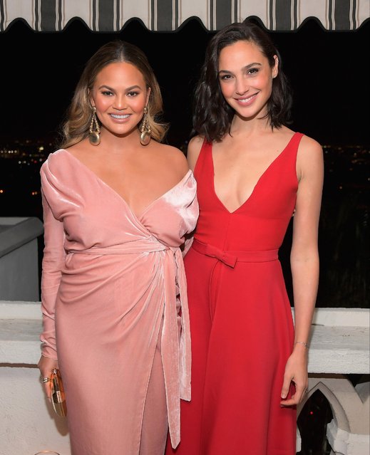 Pregnant Chrissy Teigen and Wonder Woman star Gal Gadot attend GQ and Dior Homme private dinner in celebration of The 2017 GQ Men Of The Year Party at Chateau Marmont on December 7, 2017 in Los Angeles, California. (Photo by Charley Gallay/Getty Images for GQ)