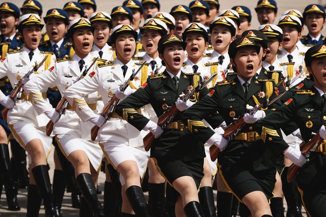 Chinese honor guards march after the arrival ceremony attended by Chinese President Xi Jinping and Azerbaijan President Ilham Aliyev at The Great Hall of The People in Beijing, China, 23 April 2025. (Photo by Iori Sagisawa/EPA/EFE)