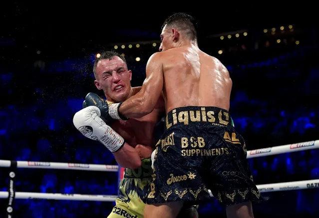 Josh Warrington (left) and Luis Alberto Lopez in action in their IBF Featherweight World Title bout at the First Direct Arena, Leeds, UK on Saturday, December 10, 2022. PA Photo. (Photo by Tim Goode/PA Wire)