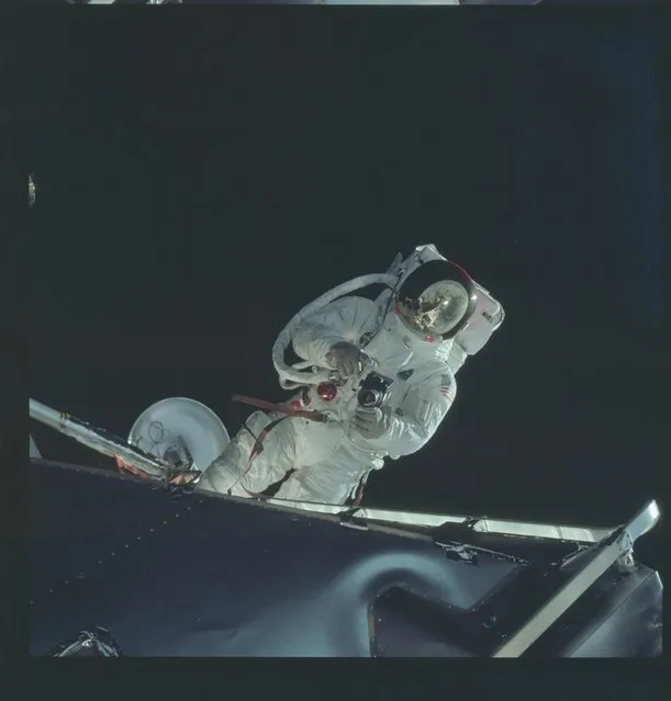 Astronaut Russell L. Schweickart, lunar module pilot, operates a 70mm Hasselblad camera during his extravehicular activity (EVA) on the fourth day of the Apollo 9 Earth-orbital mission in this March 6, 1969 NASA handout photo. (Photo by Reuters/NASA)