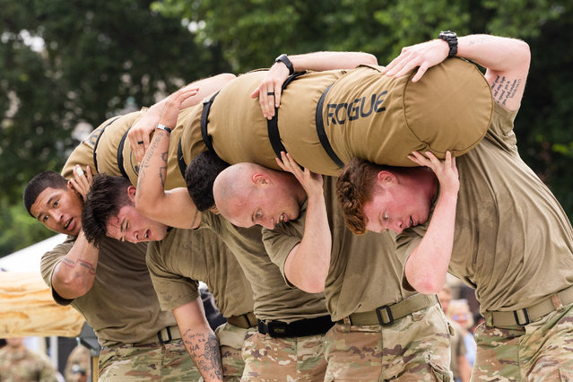 Army Servicemen compete in the fitness challenge at the U.S. Army 250th Birthday Festival. The U.S. Capitol in the background of a helicopter at the U.S. Army 250th Birthday Festival in Washington, District Of Columbia on June 14, 2025. (Photo by The Mega Agency)