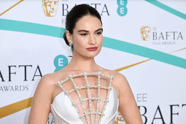 English actress Lily James poses during the EE BAFTA Film Awards 2023 at The Royal Festival Hall on February 19, 2023 in London, England. (Photo by Anthony Harvey/Rex Features/Shutterstock)