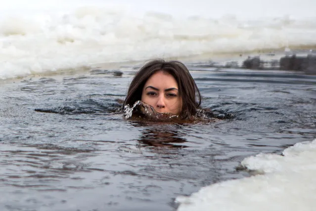 Inna Vladimirskaya skinny dips in one of the coldest rivers in Europe every week. Her swim was captured on camera by Czech photographer David Tensinsky. (Photo by David Tesinsky/Caters News Agency)