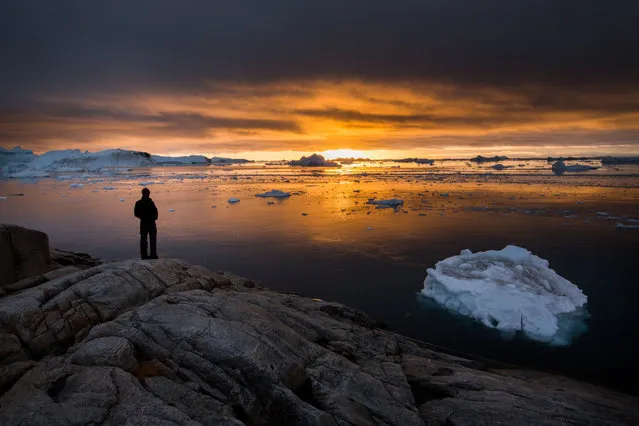 He plans to return to the area in 2016, along with a fellow photographer and 16 participants, offering photo workshops in Illulissat and nearby Disko Bay. (Photo by Paul Zizkas/Caters News)
