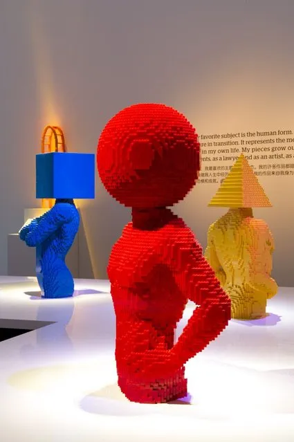 “A trio of torsos with shapes for heads”. (Photo by Nathan Sawaya/The Art of the Brick)