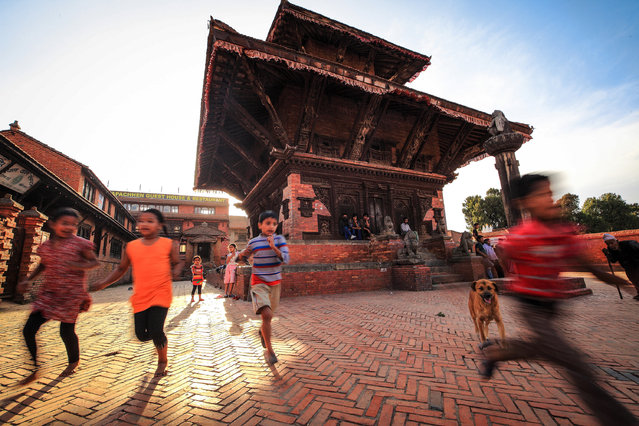 “Nepal, Keeping Running”. One, Two, Three, Let's Go... Location: Bhaktapur, Nepal. (Photo and caption by Mac Kwan/National Geographic Traveler Photo Contest)