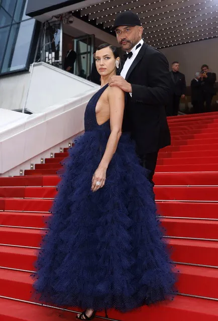 Russian model Irina Shayk (L) and Chief creative officer of Burberry Group Riccardo Tisci arrive for the screening of “Killers of the Flower Moon” during the 76th annual Cannes Film Festival, in Cannes, France, 20 May 2023. The festival runs from 16 to 27 May. (Photo by Guillaume Horcajuelo/EPA)