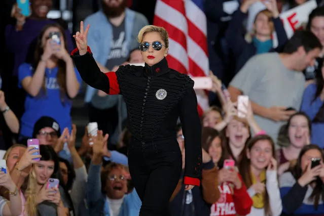 Singer Lady Gaga gestures as she walks on stage to perform before Democratic presidential nominee Hillary Clinton at a campaign rally in Raleigh, North Carolina November 8, 2016. (Photo by Chris Keane/Reuters)