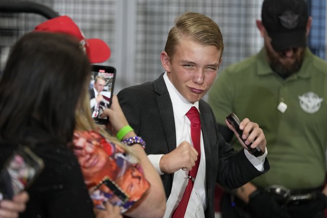 A young supporter arrives before Republican presidential nominee former President Donald Trump at a campaign event at Dane Manufacturing, Tuesday, October 1, 2024, in Waunakee, Wis. (Photo by Charlie Neibergall/AP Photo)