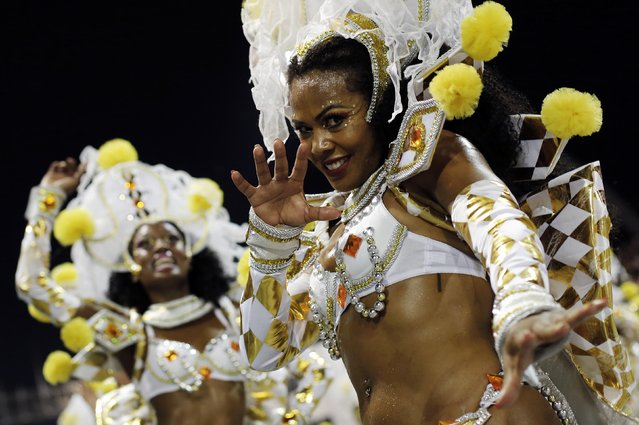 Revellers from Tom Maior Samba School take part in a carnival at Anhembi Sambadrome in Sao Paulo February 14, 2015. (Photo by Nacho Doce/Reuters)