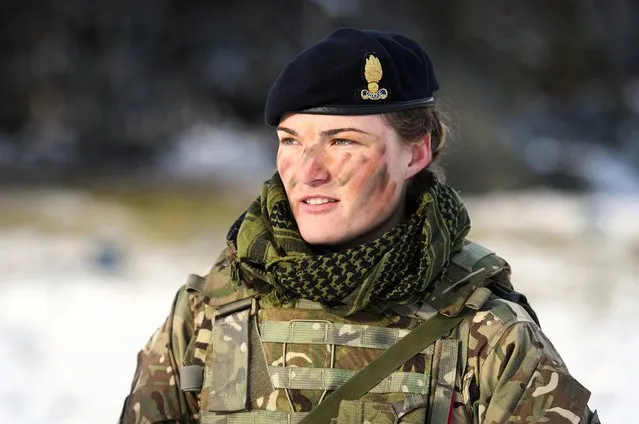 Lt George from the Royal Engineers, a corps of the British Army, speaks to a colleague as she takes part in pre-exercise integration training on October 25, 2018 in Telneset, Norway. Over 40,000 participants from 31 nations will take part in the exercise to test inter-operability between forces, and is the largest exercise of its kind to be held in Norway since the 1980s. (Photo by Leon Neal/Getty Images)