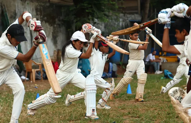 A batting coaching session for Advance Sports and Events Cricket Academy takes place at Cross Maidan Garden, Mumbai, India on October 18, 2023. (Photo by Andrew Boyers/Reuters)