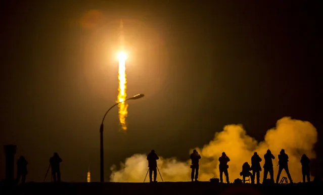 In this handout provided by NASA, The Soyuz TMA-16M spacecraft is seen as it launches to the International Space Station with Expedition 43 NASA Astronaut Scott Kelly, Russian Cosmonauts Mikhail Kornienko, and Gennady Padalka of the Russian Federal Space Agency (Roscosmos) onboard Saturday, March 28, 2015. (Photo by Bill Ingalls/NASA via Getty Images)