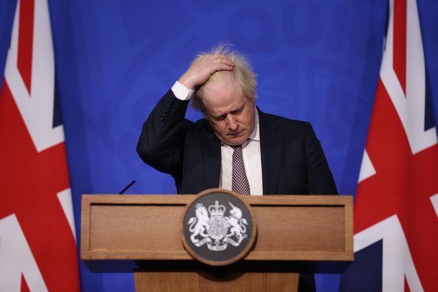 Britain's Prime Minister Boris Johnson speaks during a press conference in London, Saturday November 27, 2021, after cases of the new COVID-19 variant were confirmed in the UK. (Photo by Hollie Adams/Pool via AP Photo)