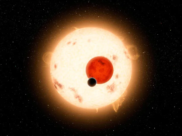 The planet Kepler-16b with its two stars. The cold planet, with its gaseous surface, is not thought to be habitable. The largest of the two stars, a K dwarf, is about 69 percent the mass of our sun, and the smallest, a red dwarf, is about 20 percent the sun's mass. (Photo by R. Hurt/Reuters/NASA/JPL-Caltech)