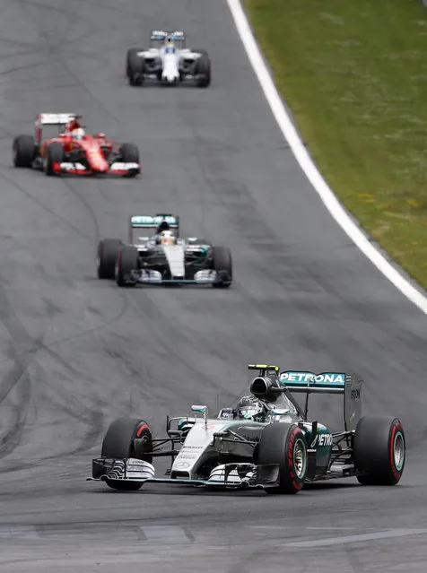 Mercedes driver Nico Rosberg of Germany, front steers his car during the the Formula One Grand Prix race, at the Red Bull Ring in Spielberg, southern Austria, Sunday, June 21, 2015. (AP Photo/Darko Bandic)