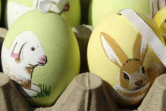 A combination of photographs shows handmade Easter eggs at an Easter market in Vienna, April 17, 2014. (Photo by Heinz-Peter Bader/Reuters)