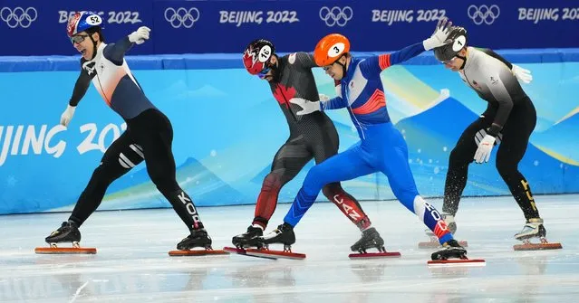 Hwang Dae-heon of South Korea crosses the line to win gold ahead of silver medallist, Steven Dubois of Canada and bronze medallist, Semen Elistratov of the Russian Olympic Committee at Capital Indoor Stadium in Beijing, China on February 9, 2022. (Photo by Aleksandra Szmigiel/Reuters)