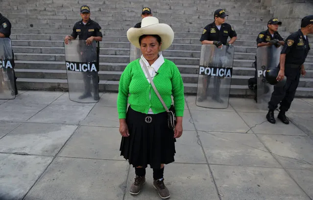 Peruvian farmer Maxima Acuna from northern Peruvian highlands of Cajamarca, leaves the Supreme Court during her trial against the Yanacocha copper and gold mine, at the Palace of Justice in Lima, Peru April 12, 2017. (Photo by Mariana Bazo/Reuters)