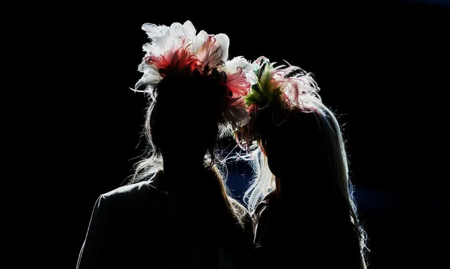 Racegoers in fashionable hats attend Ladies Day at Cheltenham Festival on March 15, 2017 in Cheltenham, England. (Photo by David Davies/PA Wire)