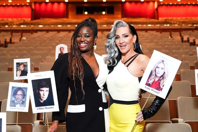 British radio broadcaster Clara Amfo (left) and American singer and television host Michelle Visage are seen at a “heads on sticks” photocall at the Royal Festival Hall in London on Tuesday, May 9, 2023 ahead of the BAFTA Television Awards on Sunday. (Photo by IAN WEST/PA Images via Getty Images)