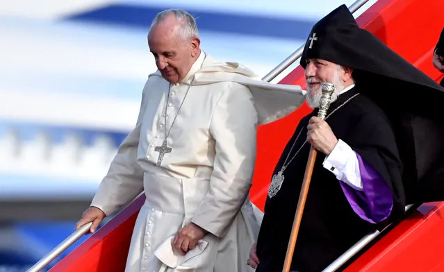 Pope Francis and Catholicos of All Armenians Karekin II step off a plane upon their arrival at Yerevan's Zvartnots Airport  June 25, 2016. (Photo by Tiziana Fabi/Reuters)