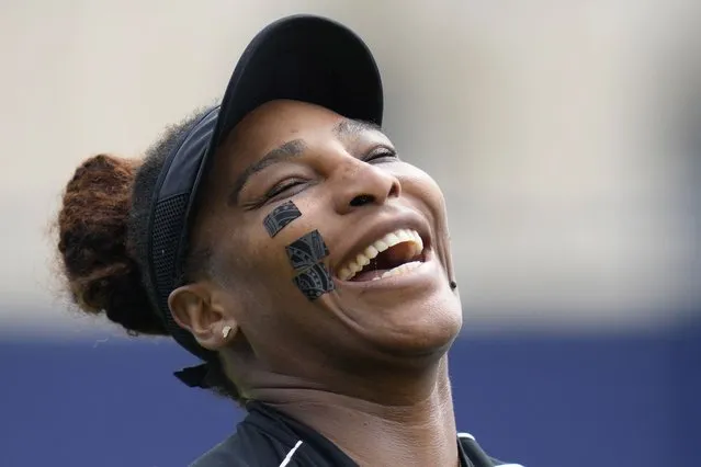 Serena Williams of the United States laughs during a practice session at the Eastbourne International tennis tournament in Eastbourne, England, Tuesday, June 21, 2022. Serena Williams will play a doubles match with partner Ons Jabeur of Tunisia at the tournament later Tuesday. (Photo by Kirsty Wigglesworth/AP Photo)