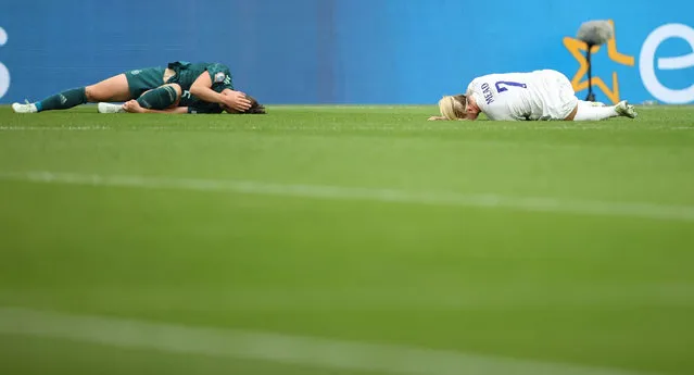 Germany's Marina Hegering and England's Beth Mead down injured during the UEFA Women's Euro 2022 final match between England and Germany at Wembley Stadium on July 31, 2022 in London, United Kingdom. (Photo by Molly Darlington/Reuters)