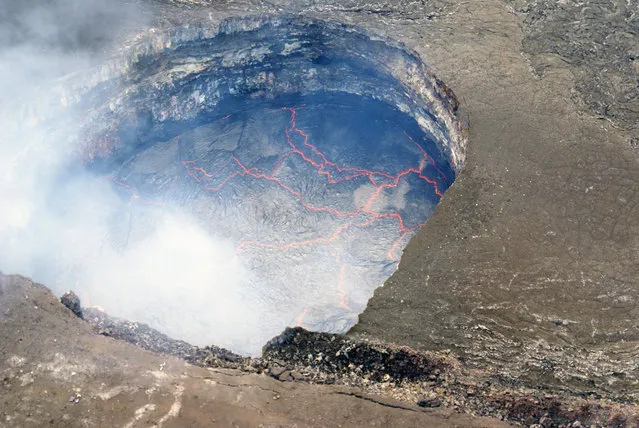 The lava lake at Kīlauea's summit. The lake was roughly 53 meters (170 feet) below the floor of Halemaʻumaʻu Crater the morning of September 17, 2014. (Photo by  U.S. Geological Survey)
