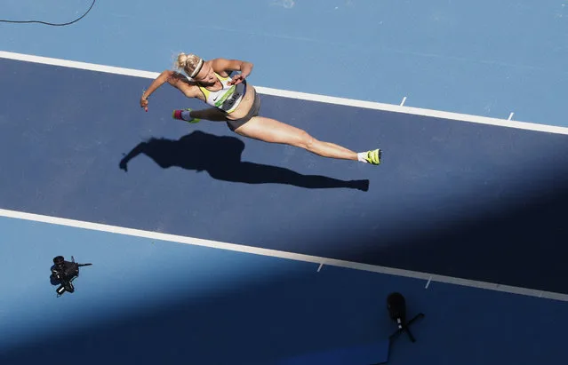 Germany's Jenny Elbe competes during a qualifying round triple jump at the athletics competitions of the 2016 Summer Olympics at the Olympic stadium in Rio de Janeiro, Brazil, Saturday, August 13, 2016. (Photo by Morry Gash/AP Photo)