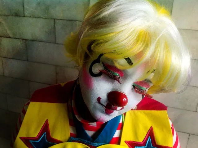 Whiteface clown Jessycorazon, 36, poses for a photo during Mexico’s 17th annual clown convention, La Feria de la Risa, in Mexico City. (Photo by Anita Baca/AP Photo)