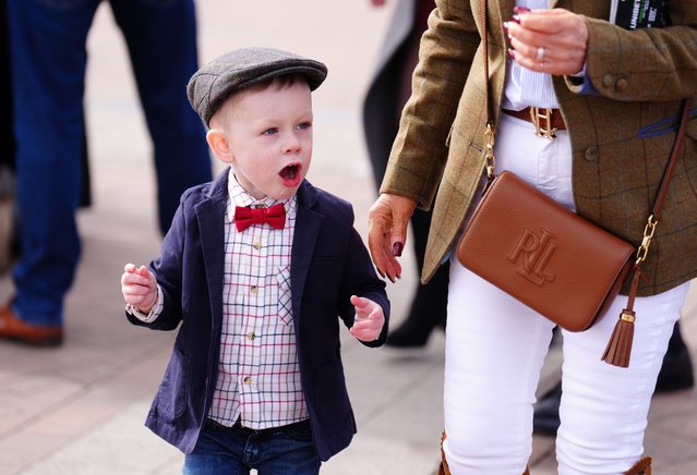 Racegoer Reggie Oisin Gallagher arrives for day one of the Cheltenham festival at Cheltenham racecourse in Cheltenham, England on March 11, 2025. (Phoot by Mike Egerton/PA Wire)
