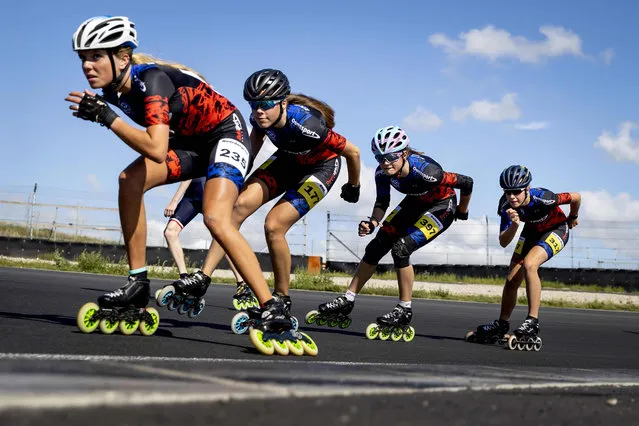 Participants take part in a training session at the Zandvoort Circuit in Zandvoort, The Netherlands, on July 21, 2020, ahead of the Inline Skating Marathon and 100m sprint to be held on August 29, 2020. (Photo by Koen Van Weel/ANP/AFP Photo)