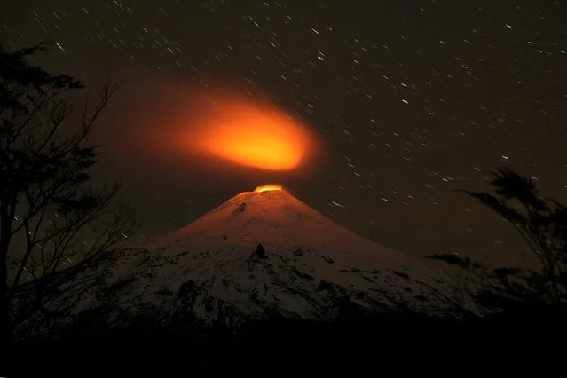 Villarrica Volcano is seen at night from Villarrica national park in Pucon, Chile, May 4, 2016. (Photo by Cristobal Saavedra/Reuters)